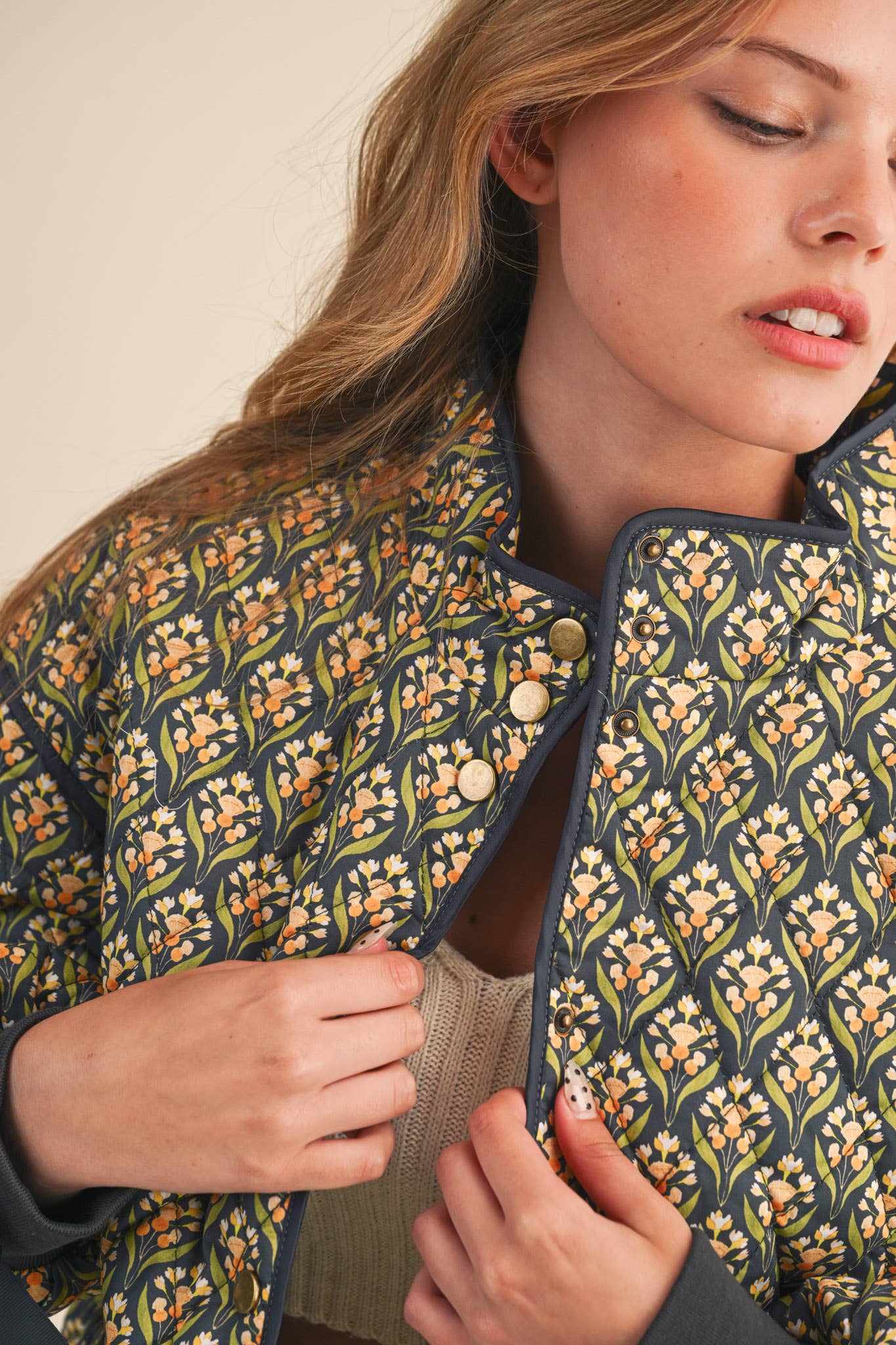FLORAL QUILTED JACKET WITH RIBBON SLEEVE DETAIL