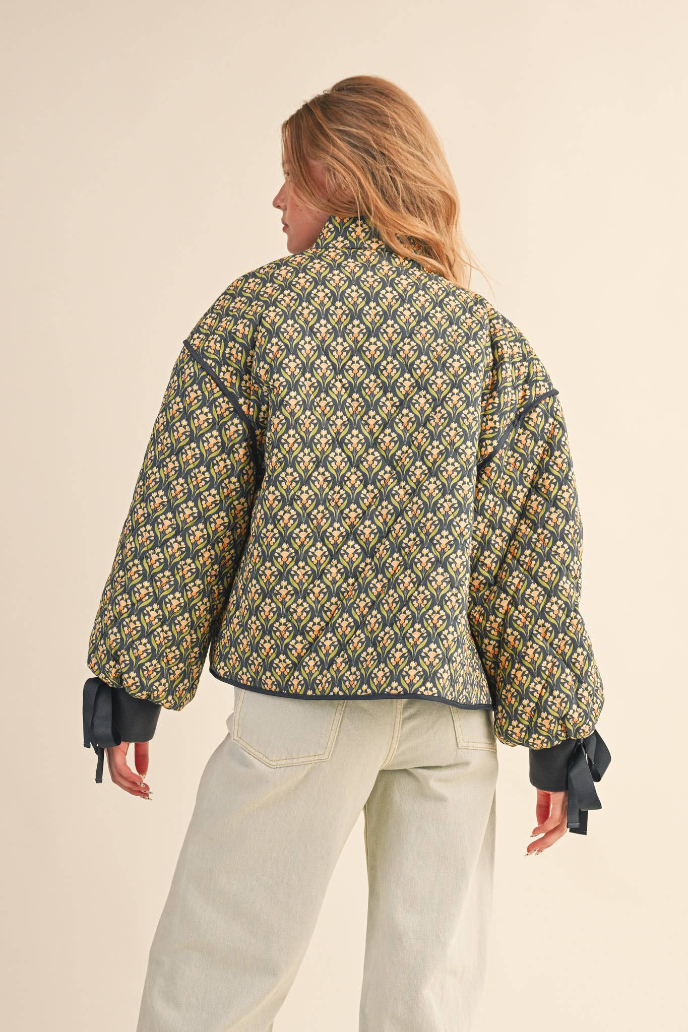 FLORAL QUILTED JACKET WITH RIBBON SLEEVE DETAIL